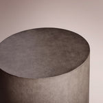Avindra Round Plinth End Table — CARAMEL