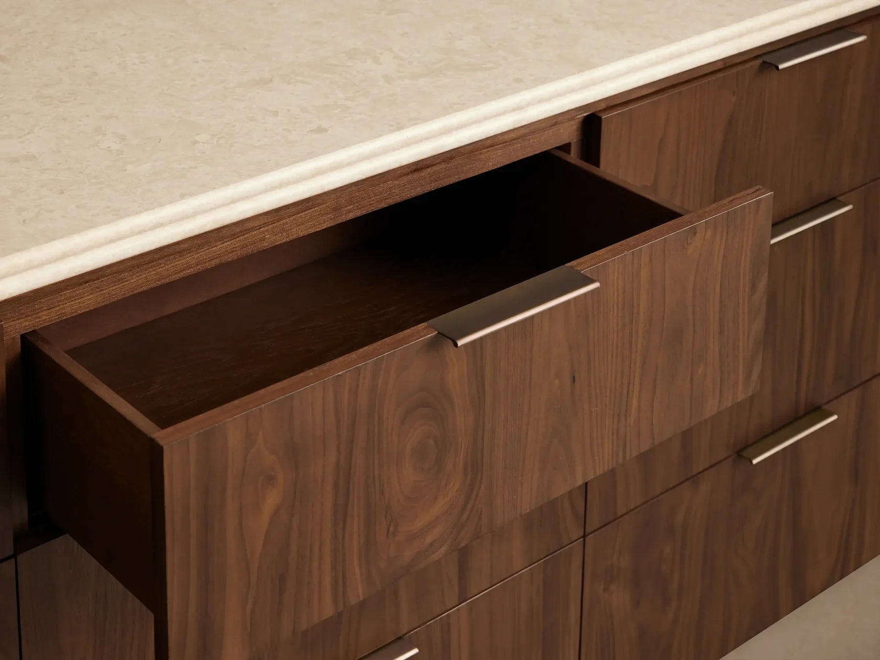Caden Nine Drawer Dresser with Stone Top 84“W