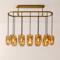 Kaelin Stacked Amber Cylinder Glass Oval Linear Chandelier