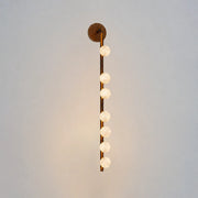 Alabaster Orb Asteria Brass Wall Sconce