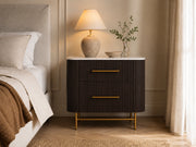 Cedar fluted oak and stone nightstand in a warm neutral bedroom
